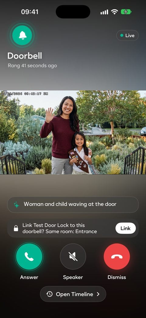 Doorbell ring screen: a woman and a child waving at the door, with Answer, Speaker and Dismiss
